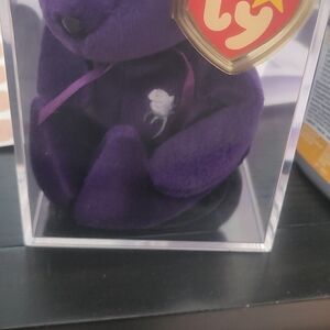 Ty Plush Bear with Purple Hue and White Rose